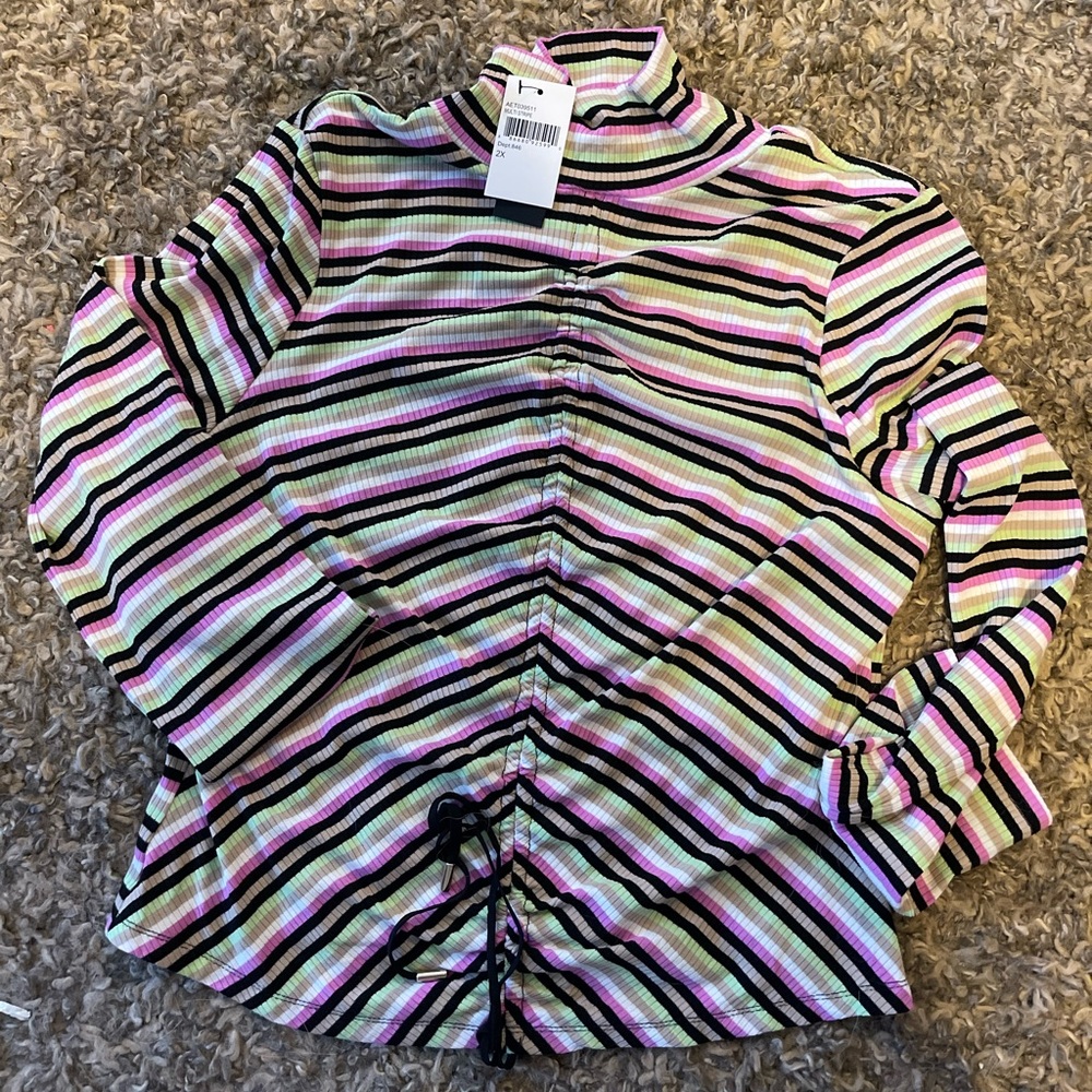 Super cute multi-stripe shirt with adjustable string ruching on the front.